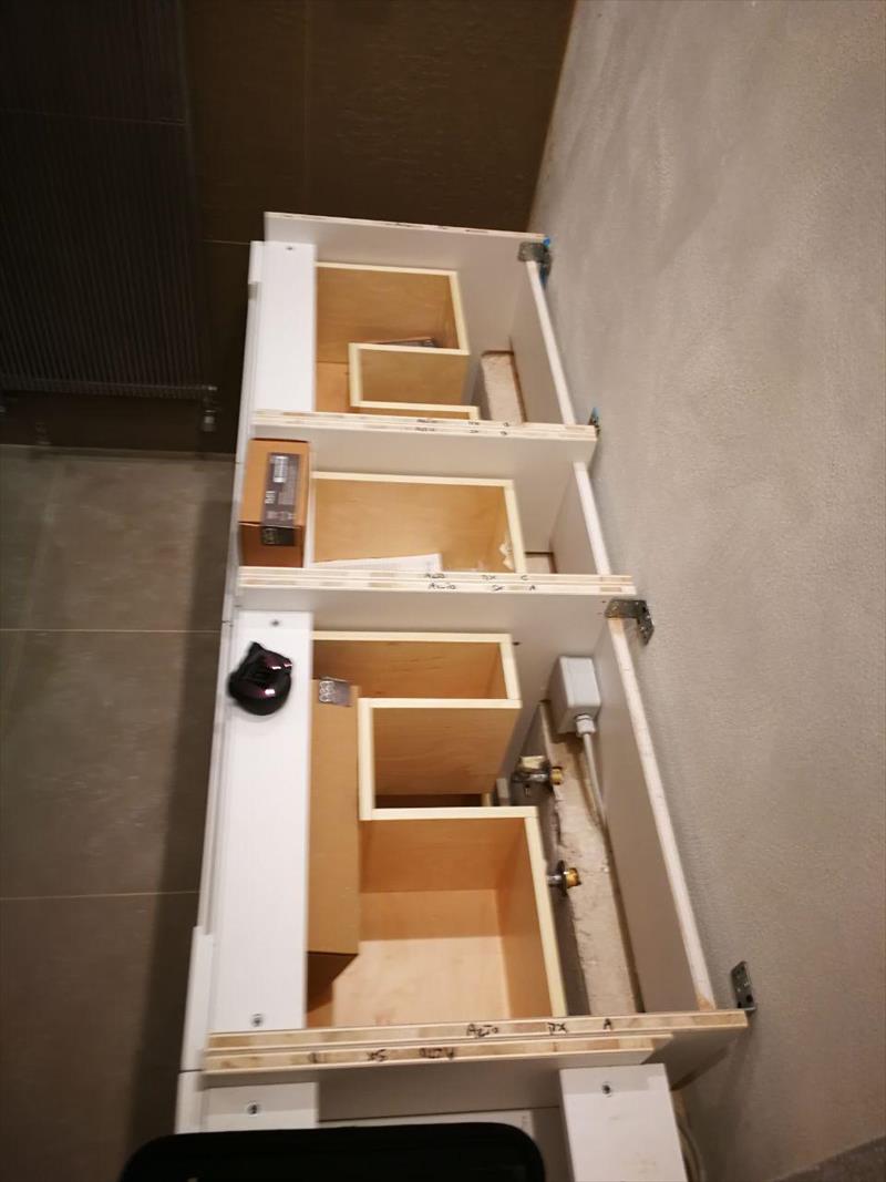 Custom bathroom furniture, installation phase